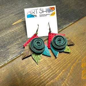 Handmade leather earrings with flower pattern